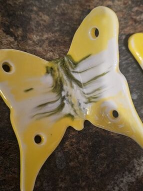 Hand made, Ceramic 4 holes each for attaching, Splatter glazed, 3.5hX3.4wX.25thi